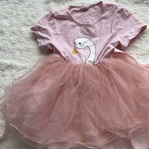 Swan tied back dress. It fit my 2 year old